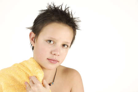 Boy with yellow towel after taking bathの写真素材