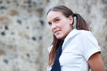 Portrait of young girl in school uniformの写真素材