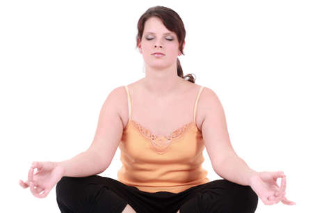 Portrait of teenage girl doing yoga poseの写真素材