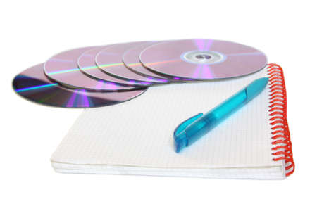 Notebook with pen and CDsの写真素材