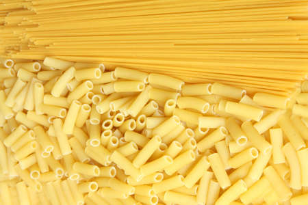 A lot of pasta. Background made from spaghetti and penneの写真素材