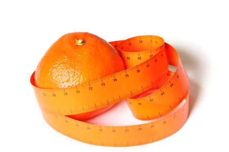 Orange and measuring tape. Isolated on whiteの写真素材