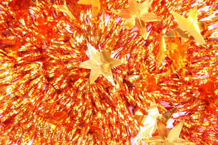 Christmas background of tinsel with starsの写真素材