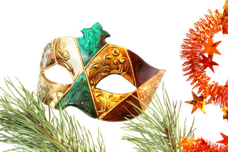 Carnival mask and christmas tree. Isolated on whiteの写真素材