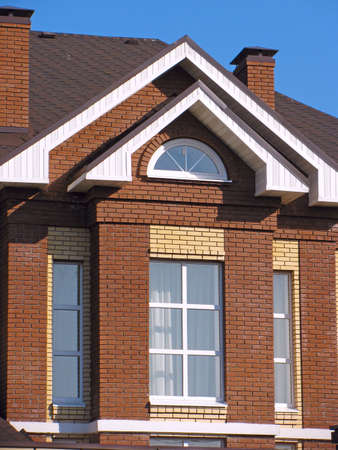 Facade of suburban brick houseの写真素材