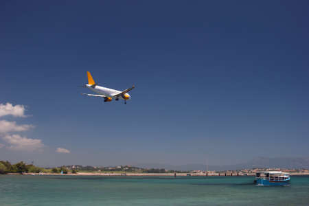 Aircraft landing at a mediterranean island  The airport in Corfu, Greeceの写真素材