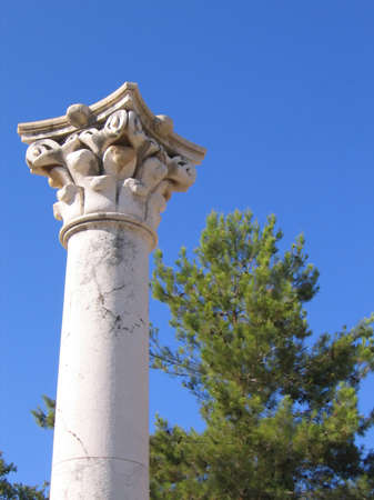 Corinthian column of ancient  Greek temple in summer dayの写真素材