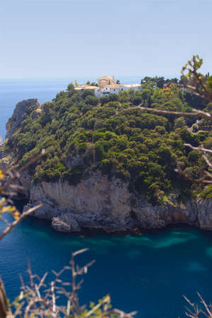 Cliffs over the sea with a monastery  Corfu, Greeceの写真素材