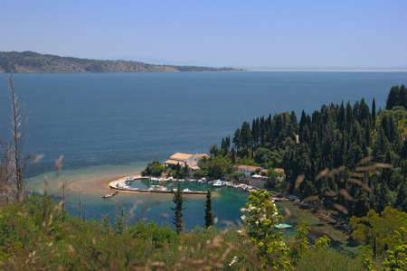 Beautiful bay with marina in Corfu, Greeceの写真素材