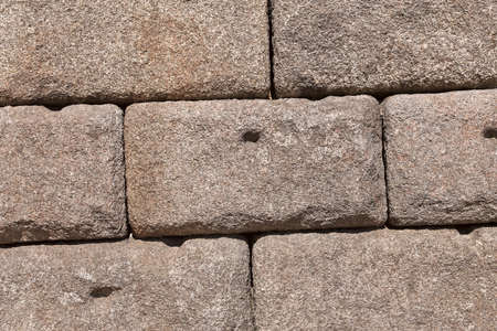 Ancient roman stone wall. Full frame backgroundの写真素材