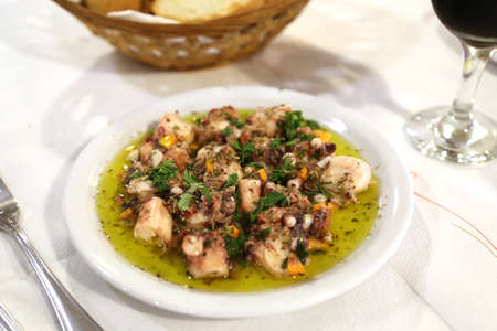 Traditional greek dinner. A snack of grilled octopusの写真素材