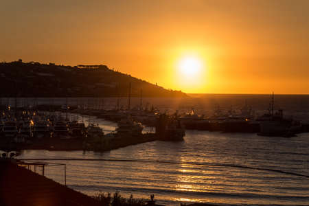 Sunrise over a port in the Mediterranean sea. Sanremo, Italyの写真素材