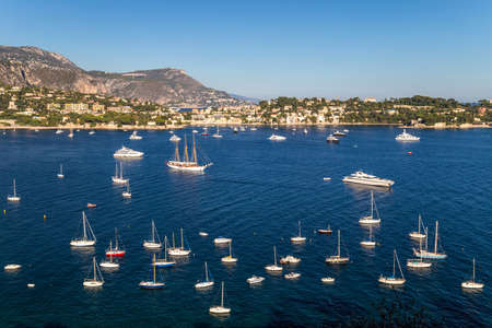 View to a beautiful bay in French Riviera. Big yachts and small boats. Villefranche-sur-Merの写真素材