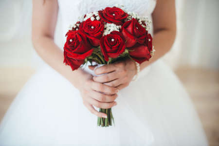 bridal bouquet of red rosesの写真素材