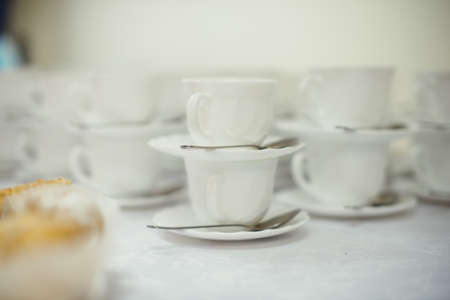Abstract blurred of many rows of coffee or tea cups for background.の写真素材
