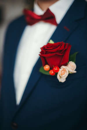 Bridal bouquet of red roses isolated on whiteの写真素材
