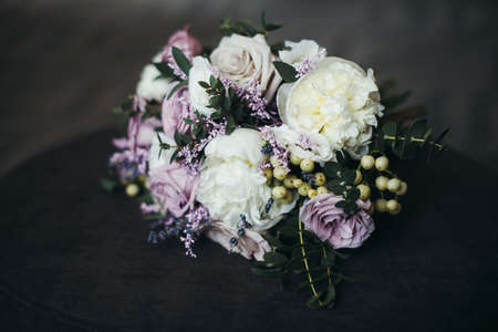 bride bouquet of purple flowersbridal bouquet of white roses and lilacの写真素材