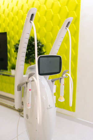 Ufa, Russia - 10 April 2025. Vertical shot of professional cosmetology machine for mesotherapy treatment placing in modern beauty clinic. Concept of non-surgery cosmetology, professional skincare.の写真素材