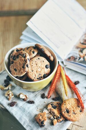 Tasty cookies or biscuits at kitchen table, home comfortの写真素材