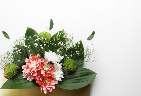 Close up beautiful spring flowers bouquet for greetings isolated on white, copyspaceの写真素材