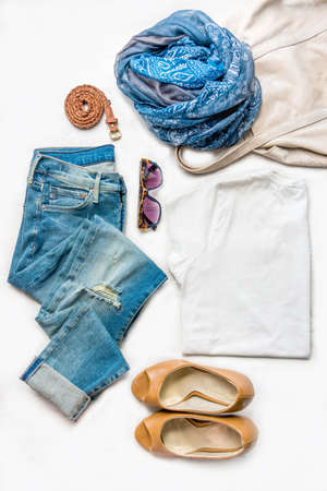 Collage of female clothing set.  Ripped jeans, white top, brown high heels shoes and accessories...
