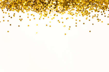 Star shaped golden sequins background. Copy space.の写真素材