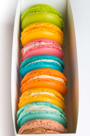 Close up of a box full of colorful macaroons.の写真素材