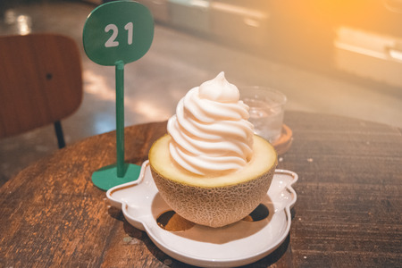 Cantaloupe ice cream serve on cafe shopの写真素材