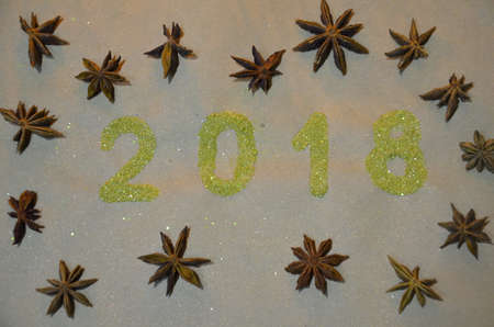 2018 with christmas decoration. concept of the new year and christmas. gold figures 2018 on the...