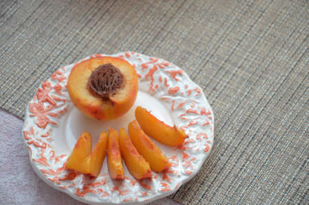 Fresh peaches, Peach close up fruit background, peach on wood background,sweet peaches, group of peaches,sliced peaches, peach slicesの写真素材