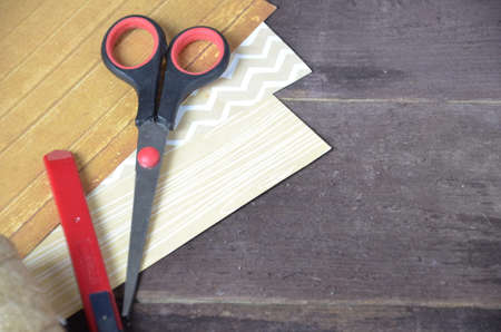 Making a scrap booking birthday card/Scrapbook, Button, Craft, Adult, Art. Sly paper, scissors, knife, for making hand maid postcard, box, for valentine day, mother's day, Easter. Greeting card. Scrapbooking. hobbyの写真素材