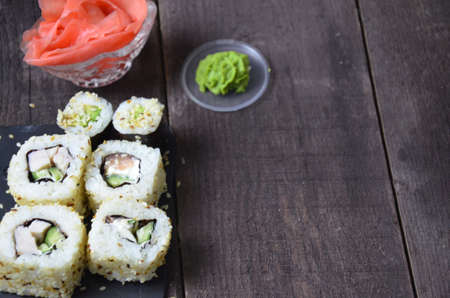 Sushi rolls set, Japanese food on the wooden backgroundの写真素材