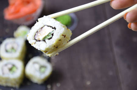 Sushi rolls set, Japanese food on the wooden backgroundの写真素材