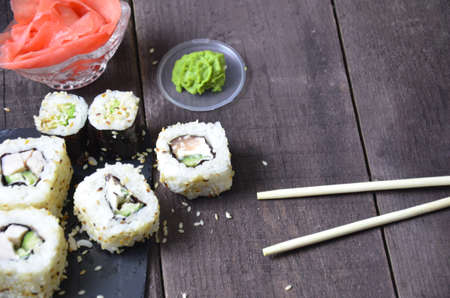 Sushi rolls set, Japanese food on the wooden backgroundの写真素材