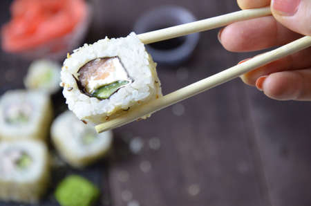 Sushi rolls set, Japanese food on the wooden backgroundの写真素材