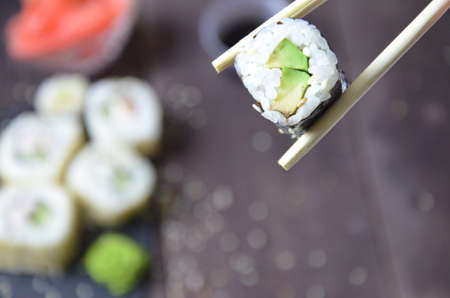 Sushi rolls set, Japanese food on the wooden backgroundの写真素材