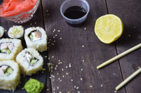 Sushi rolls set, Japanese food on the wooden backgroundの写真素材