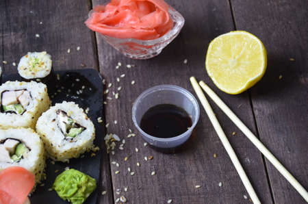 Sushi rolls set, Japanese food on the wooden backgroundの写真素材