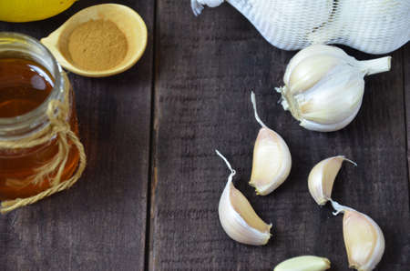Garlic and honey, fresh and healthy food products, concept for healthy nutrition and strengthening immunityの写真素材