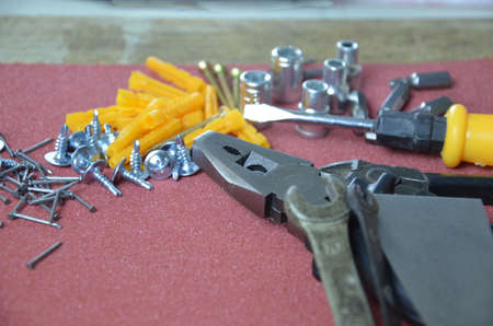 Top view of Working tools,wrench,socket wrench,hammer,screwdriver,plier,electric drill,tape...