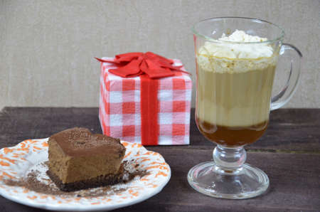 cake-hearts, boxes with presents and a Cup of black coffee, congratulation with Valentine's day.の写真素材