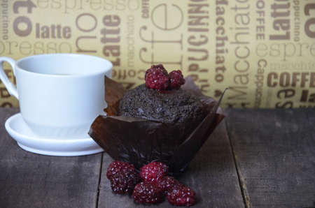 coffee with a muffinの写真素材