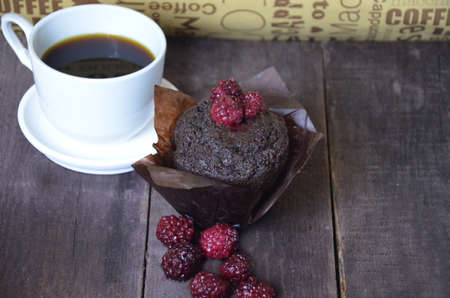 coffee with a muffinの写真素材