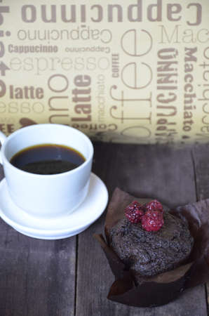 coffee with a muffinの写真素材