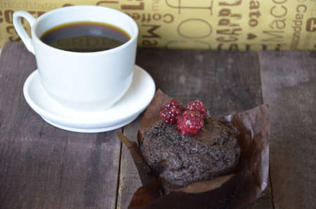 coffee with a muffinの写真素材