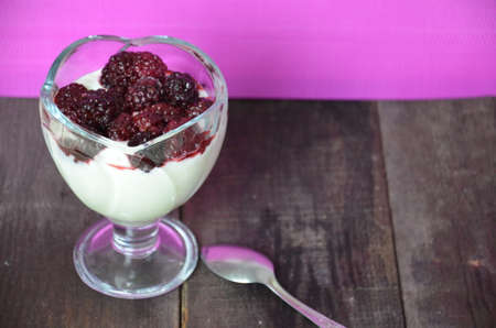 Various dessert breakfast pudding, rice porridge in glass decorated by fresh blackberries, pudding, ice cream, yogurt with blackberries. Beautiful, delicious, low-calorie dessert Breakfast, snack.の写真素材