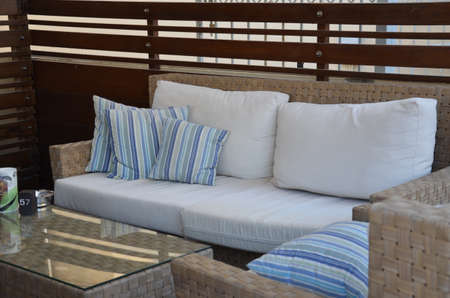 Modern design sofa and a table in a cafeの写真素材