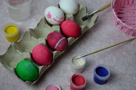 Colorful handmade easter eggs balls with paint and bruch. craft, home made decorations for easterの写真素材