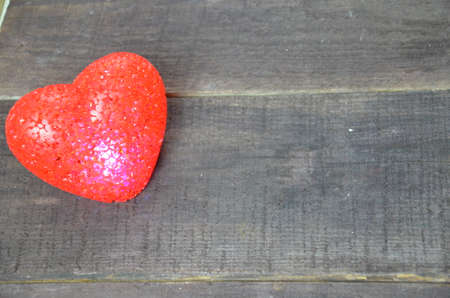 Valentine's Day symbol. Heart on a wooden background.の写真素材