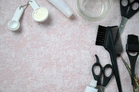 hairdresser Accessories for coloring hair on a pink backgroundの写真素材